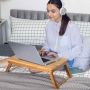 Multifunctional bamboo laptop tray with adjustable legs and tilting table top, natural