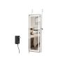 Hanging jewelry cabinet with lighting around the mirror